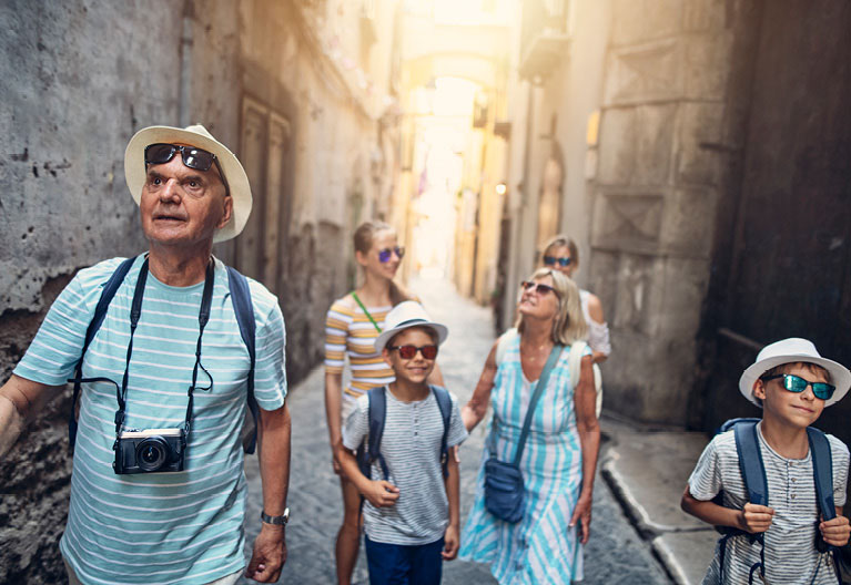 A family walking around in a city together.