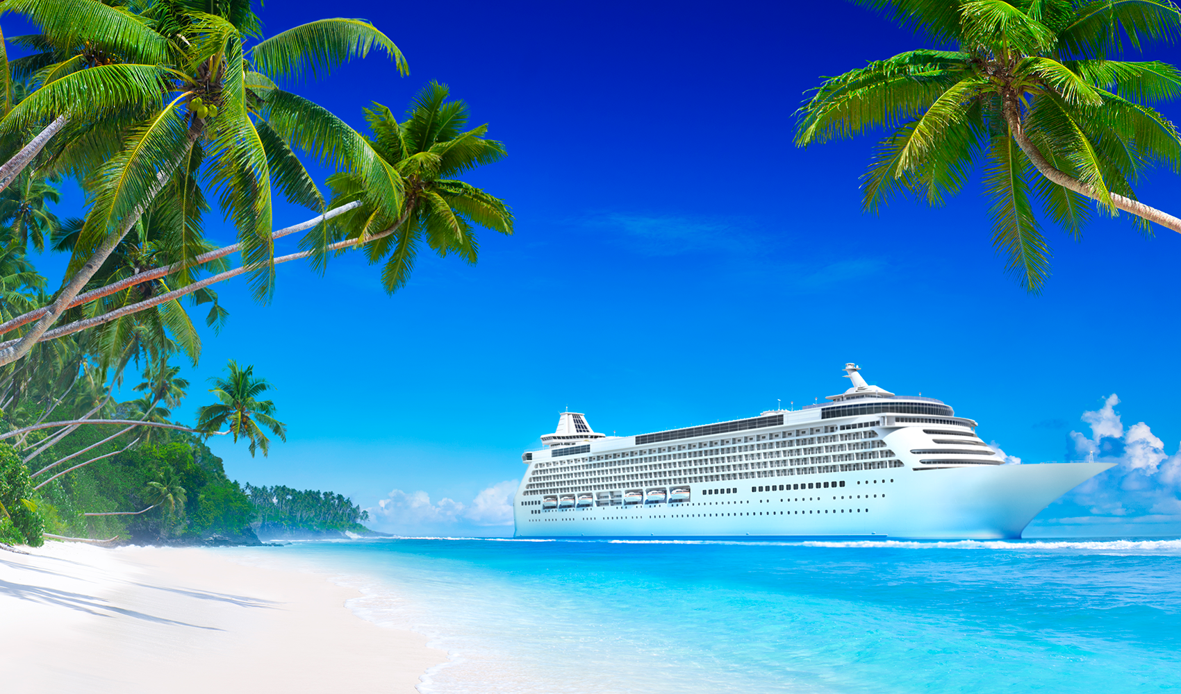 cruise ship by tropical island shore