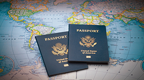 Passports on a world map.