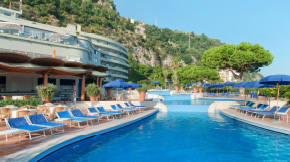 A table on a rooftop at a restaurant in Italy. 