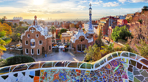 quaint city in spain with a mosaic railing in the forefront of the photo